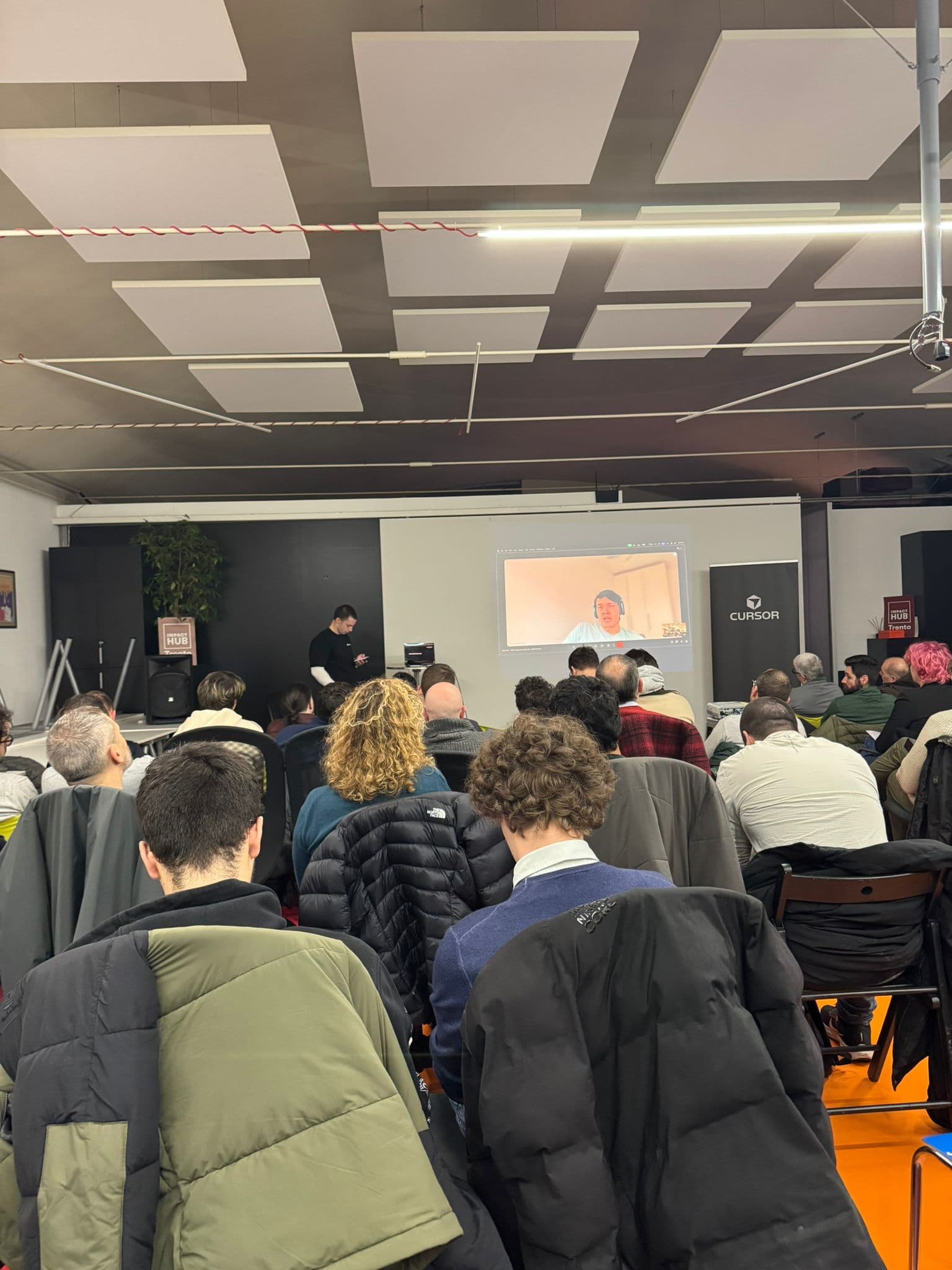 Community talks during an evening event